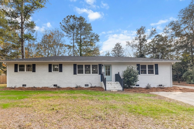 single story home featuring a front yard