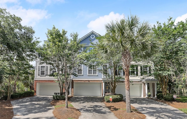 167 Palm Cove Way, Mount Pleasant, SC 29466 - view of front of house with a garage, driveway, and brick siding