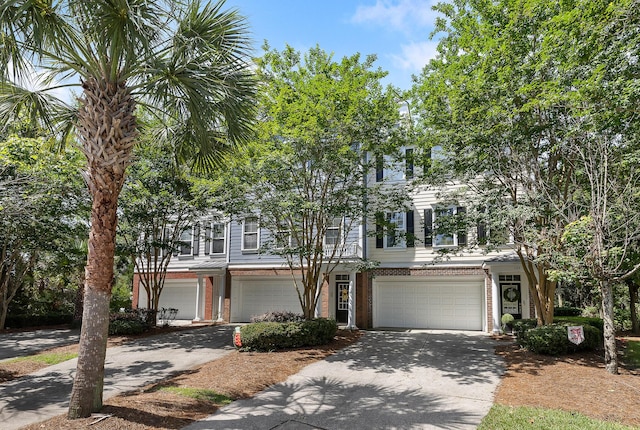 167 Palm Cove Way, Mount Pleasant, SC 29466 - multi unit property featuring concrete driveway, a garage, and brick siding