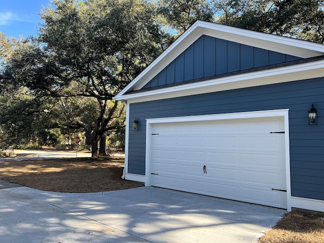 garage featuring driveway