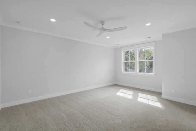 unfurnished room featuring ornamental molding, recessed lighting, carpet flooring, and baseboards