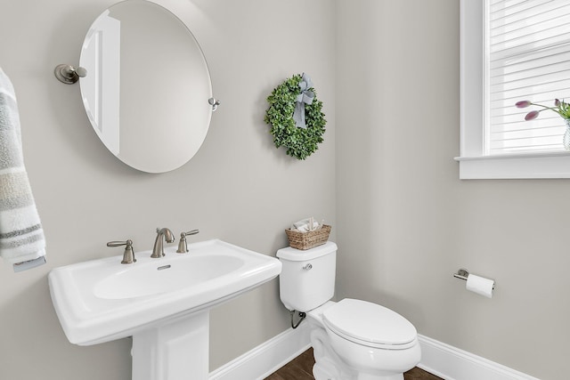 2072 Amenity Park Dr, Mount Pleasant, SC 29466 - bathroom with baseboards, toilet, and a sink