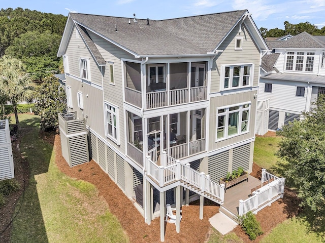 2072 Amenity Park Dr, Mount Pleasant, SC 29466 - rear view of property with a sunroom and roof with shingles