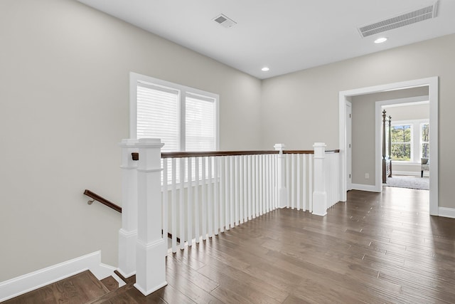 2072 Amenity Park Dr, Mount Pleasant, SC 29466 - hall with an upstairs landing, wood finished floors, baseboards, and recessed lighting