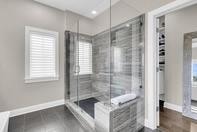 2072 Amenity Park Dr, Mount Pleasant, SC 29466 - bathroom with a spacious closet, a stall shower, baseboards, recessed lighting, and tile patterned flooring