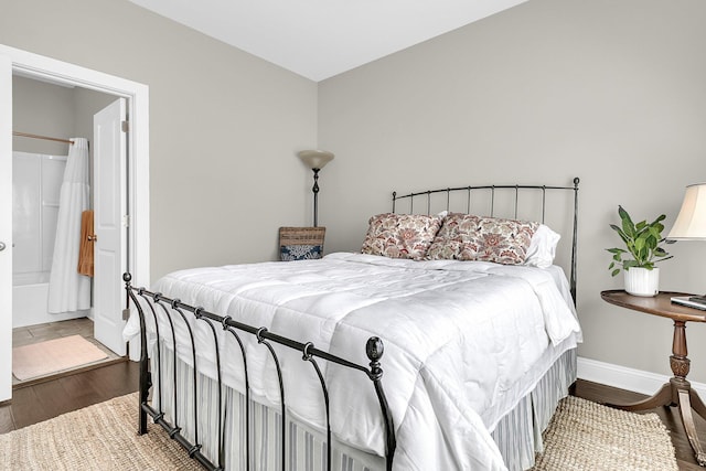 2072 Amenity Park Dr, Mount Pleasant, SC 29466 - bedroom with wood finished floors, baseboards, and ensuite bathroom