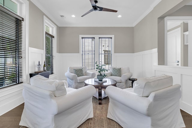 2072 Amenity Park Dr, Mount Pleasant, SC 29466 - living room with a decorative wall, a wainscoted wall, a ceiling fan, ornamental molding, and recessed lighting