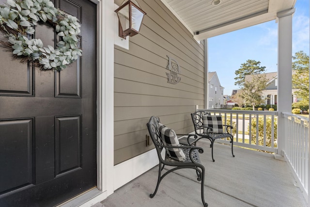 balcony featuring covered porch