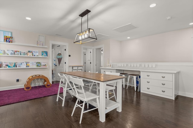 dining room featuring dark wood-type flooring