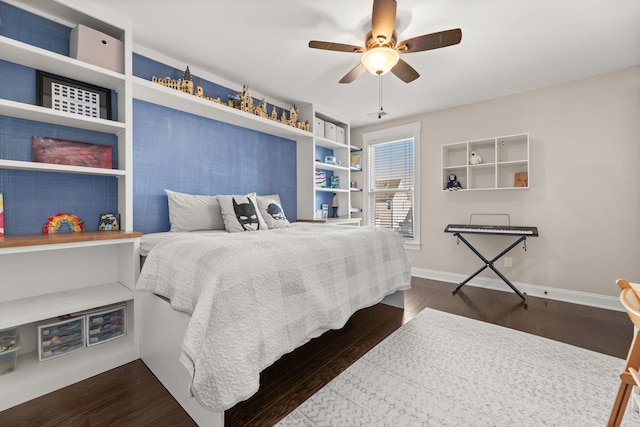 bedroom featuring ceiling fan and dark wood-type flooring