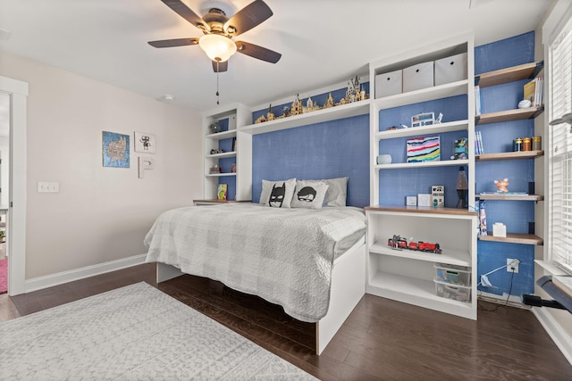 bedroom featuring ceiling fan and dark hardwood / wood-style flooring