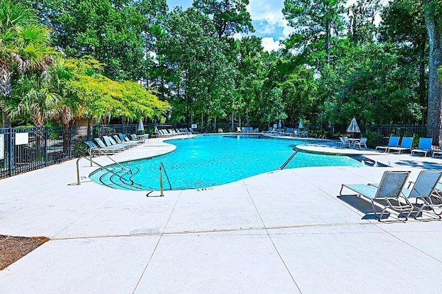 view of pool with a patio