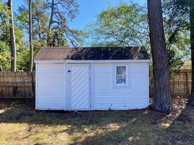 view of shed featuring a fenced backyard