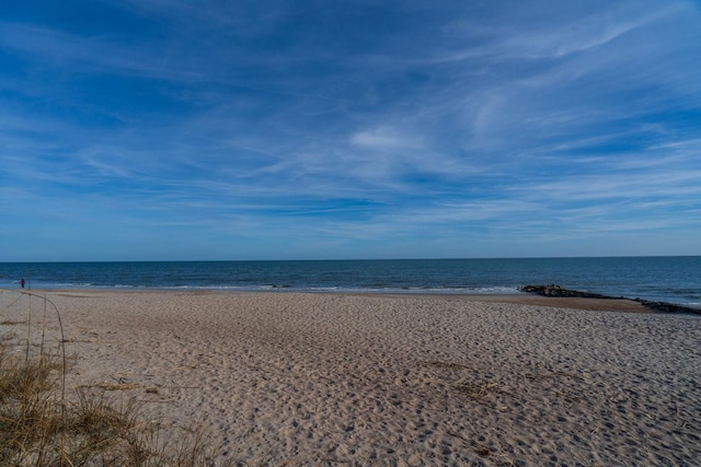 view of water feature featuring a beach view