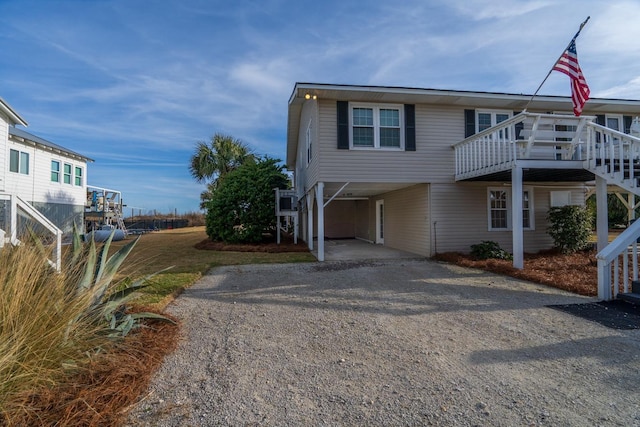 exterior space featuring a carport