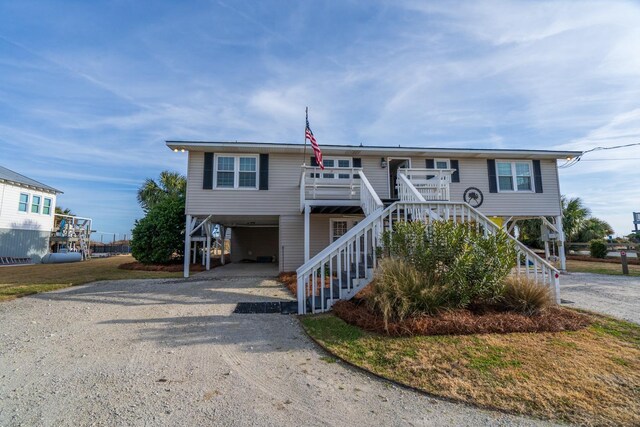 view of front facade with a carport