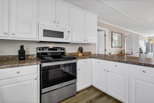 kitchen featuring white cabinetry, electric range, crown molding, and dark hardwood / wood-style floors