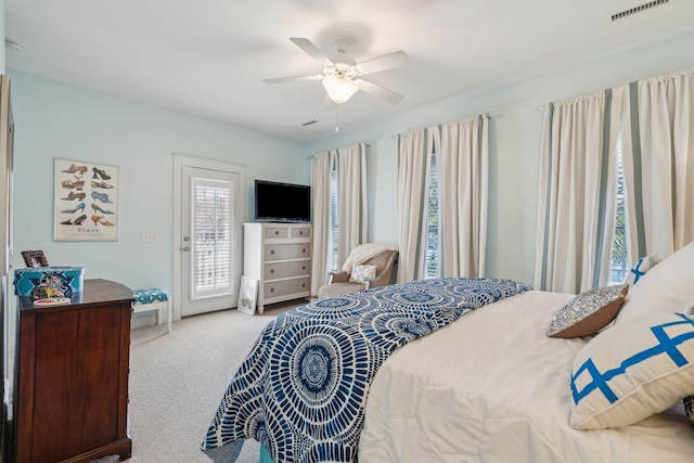 bedroom featuring ceiling fan, carpet flooring, and access to outside