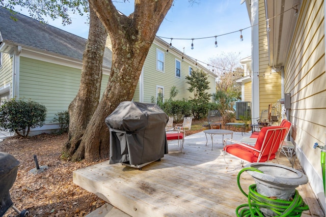 view of patio / terrace featuring area for grilling and a wooden deck