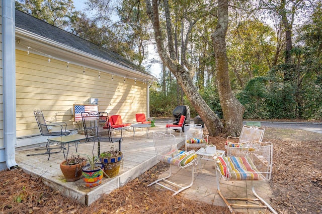 view of patio / terrace featuring a wooden deck