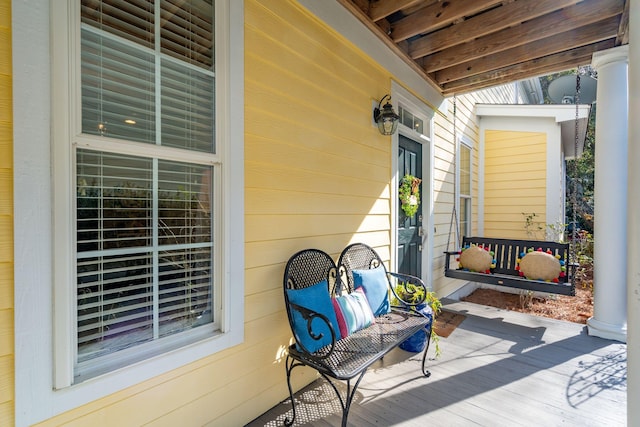 wooden terrace with covered porch