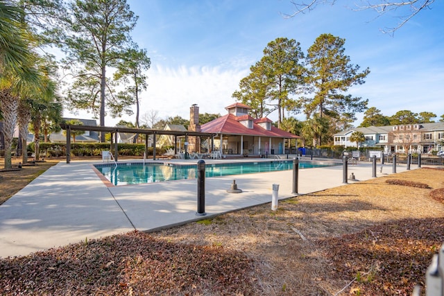 view of pool featuring a patio