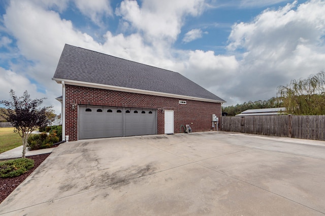 view of property exterior featuring a garage