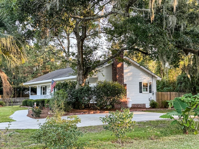 exterior space with a front lawn