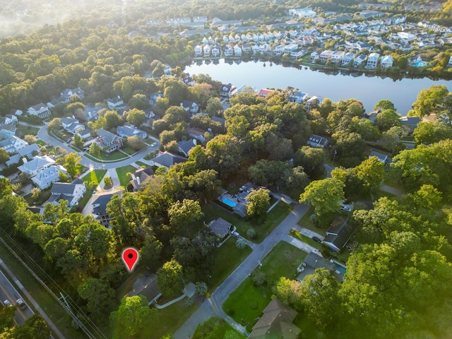 bird's eye view featuring a residential view and a water view