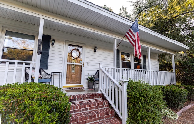 entrance to property with covered porch