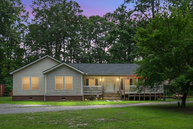 785 Coral Acres Dr, Moncks Corner, SC 29461 - ranch-style home with crawl space, covered porch, and a lawn