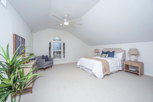 bedroom featuring ceiling fan, carpet, and lofted ceiling