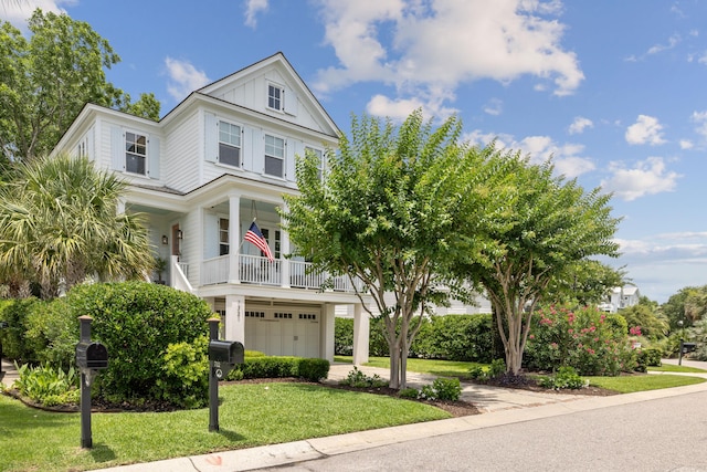 732 Gate Post Dr, Mount Pleasant, SC 29464 - view of front of home with a garage, board and batten siding, a front lawn, and driveway