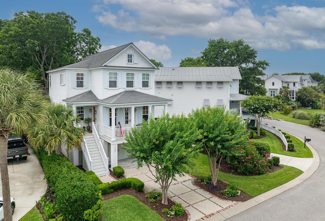 732 Gate Post Dr, Mount Pleasant, SC 29464 - view of front of property with a porch, stairway, a shingled roof, and concrete driveway