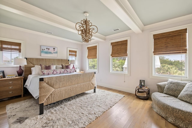 732 Gate Post Dr, Mount Pleasant, SC 29464 - bedroom featuring a chandelier, wood finished floors, beamed ceiling, and ornamental molding