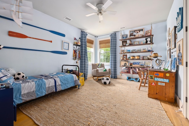 732 Gate Post Dr, Mount Pleasant, SC 29464 - bedroom with light wood finished floors and ceiling fan