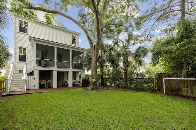 732 Gate Post Dr, Mount Pleasant, SC 29464 - rear view of property with a fenced backyard, a sunroom, and stairway