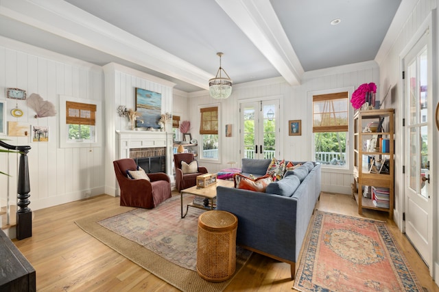 732 Gate Post Dr, Mount Pleasant, SC 29464 - living area featuring light wood-style floors, beam ceiling, a fireplace, and crown molding
