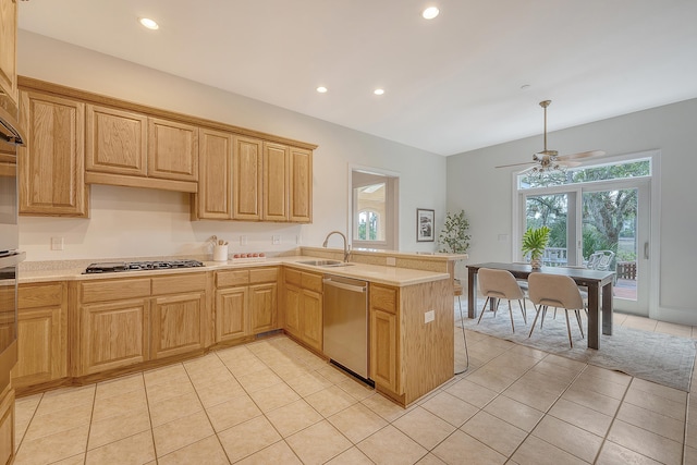 3331 Cottonfield Dr, Mount Pleasant, SC 29466 - kitchen featuring stainless steel dishwasher, a sink, gas stovetop, light countertops, and a peninsula