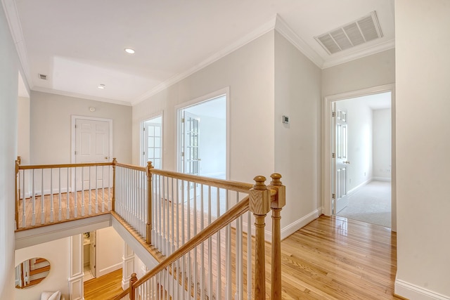 3331 Cottonfield Dr, Mount Pleasant, SC 29466 - hallway with an upstairs landing, light wood-style floors, crown molding, baseboards, and recessed lighting