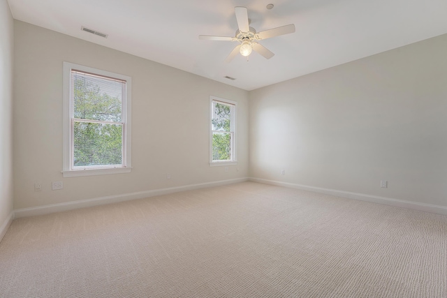 3331 Cottonfield Dr, Mount Pleasant, SC 29466 - empty room featuring baseboards, light colored carpet, and a ceiling fan