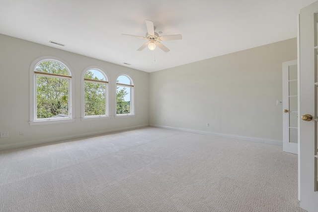 3331 Cottonfield Dr, Mount Pleasant, SC 29466 - empty room featuring a ceiling fan, light carpet, and baseboards