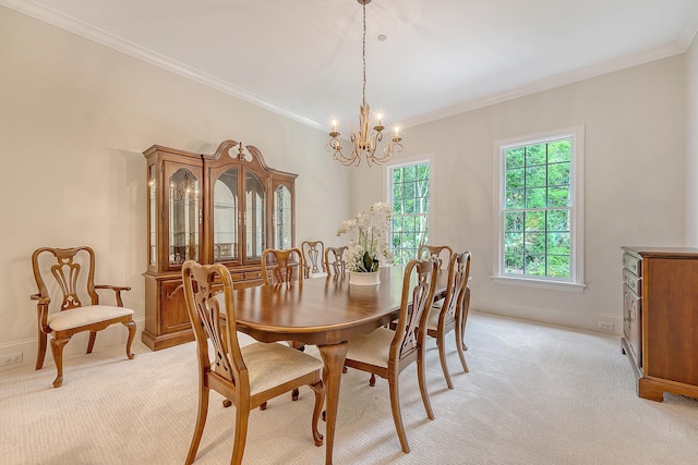 3331 Cottonfield Dr, Mount Pleasant, SC 29466 - dining room featuring light colored carpet, crown molding, a chandelier, and baseboards
