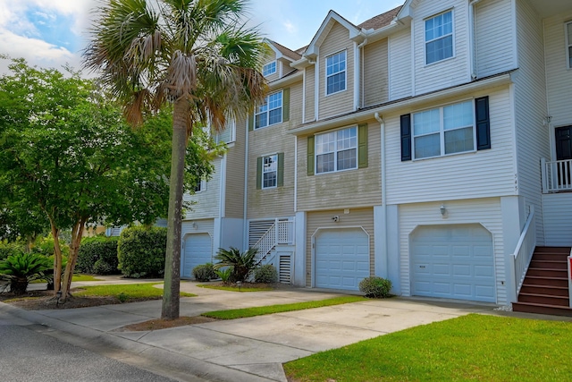543 Mclernon Trce, Johns Island, SC 29455 - view of property featuring stairway, an attached garage, and driveway