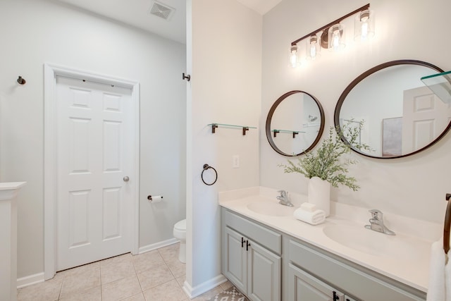 543 Mclernon Trce, Johns Island, SC 29455 - full bath with toilet, double vanity, tile patterned flooring, and baseboards