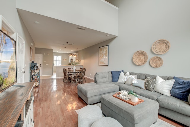 543 Mclernon Trce, Johns Island, SC 29455 - living room with light wood finished floors, baseboards, recessed lighting, and a chandelier