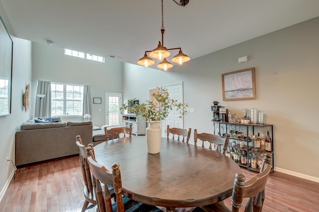 543 Mclernon Trce, Johns Island, SC 29455 - dining area featuring light wood finished floors, baseboards, and a chandelier