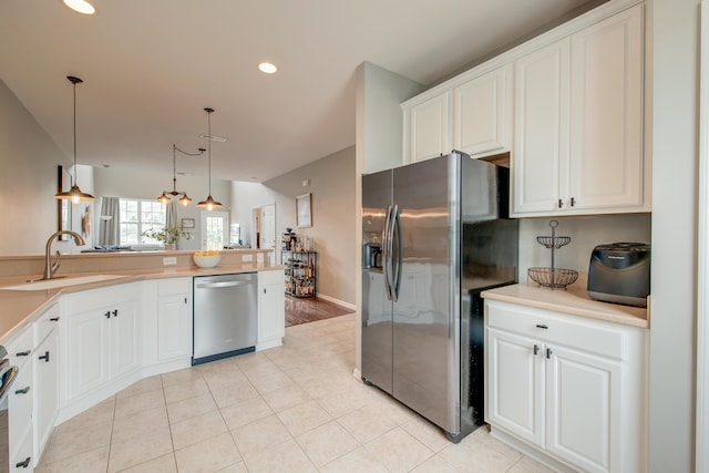 543 Mclernon Trce, Johns Island, SC 29455 - kitchen featuring stainless steel appliances, a sink, recessed lighting, white cabinets, and hanging light fixtures