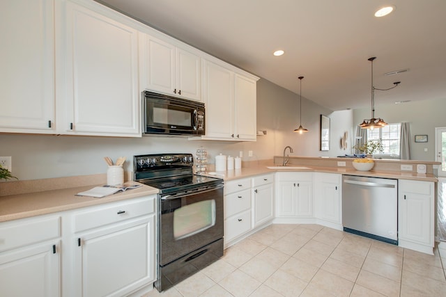 543 Mclernon Trce, Johns Island, SC 29455 - kitchen featuring black appliances, a sink, a peninsula, decorative light fixtures, and light countertops