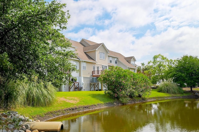 543 Mclernon Trce, Johns Island, SC 29455 - rear view of property featuring stairs, a yard, and a water view